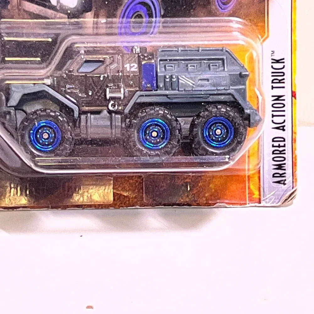 Matchbox Jurassic World Armored Action Truck Grey Blue Dominion Die-Cast HBH06